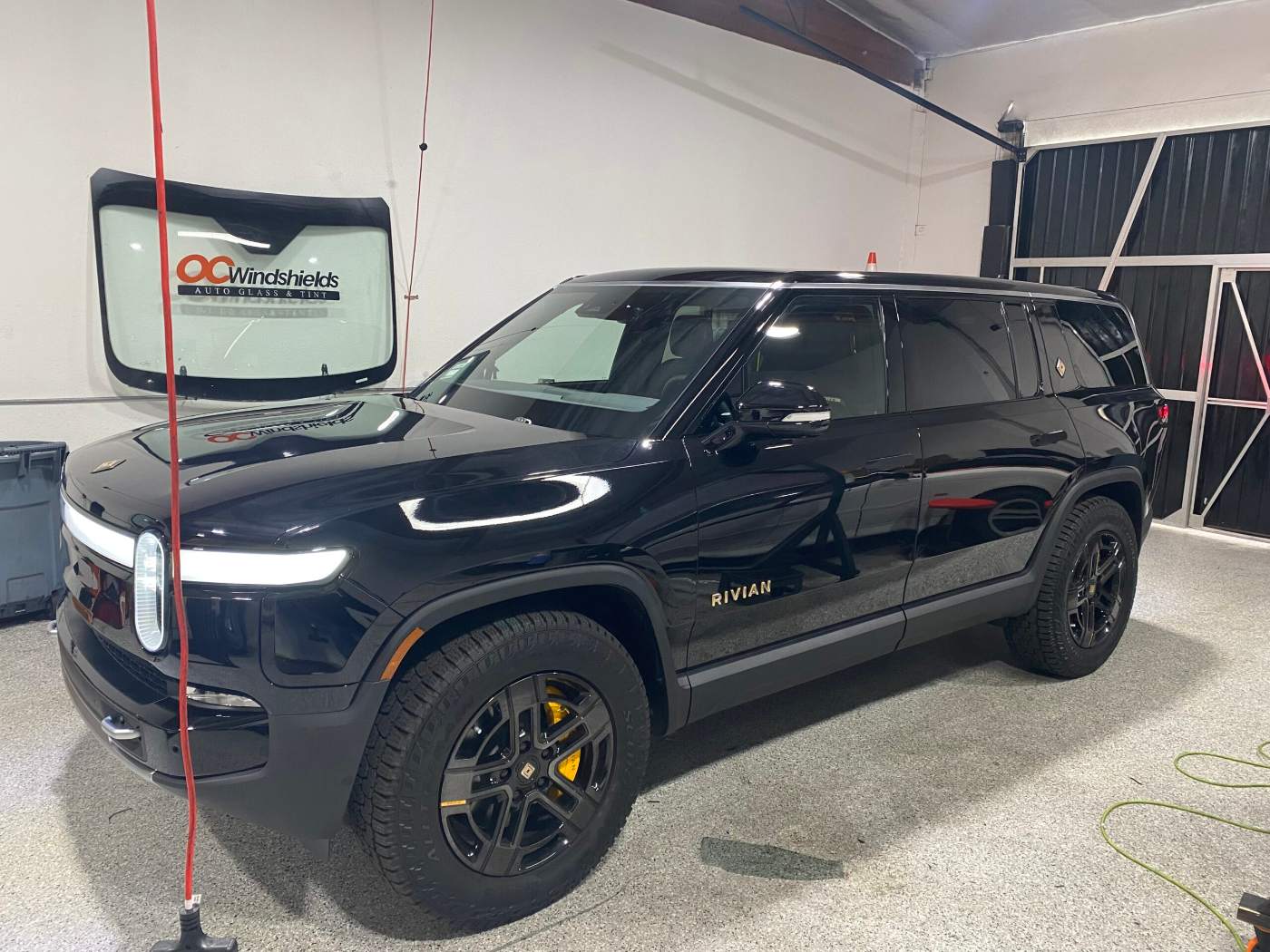 Rivian in the OC Windshields bay